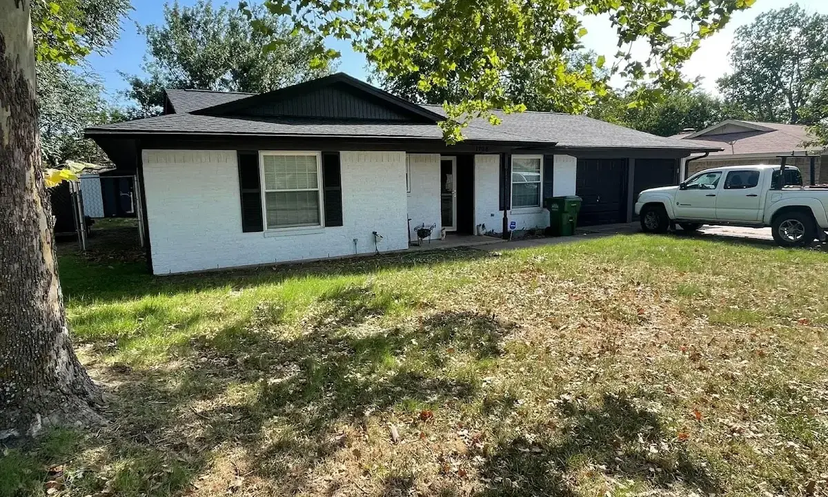 Professional roofing crew working on a residential roof in Grovetown